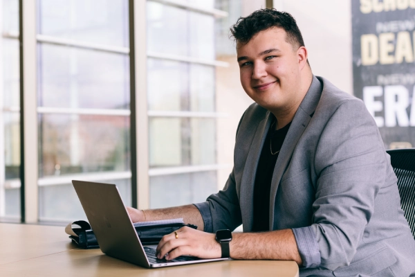 graduate student with laptop