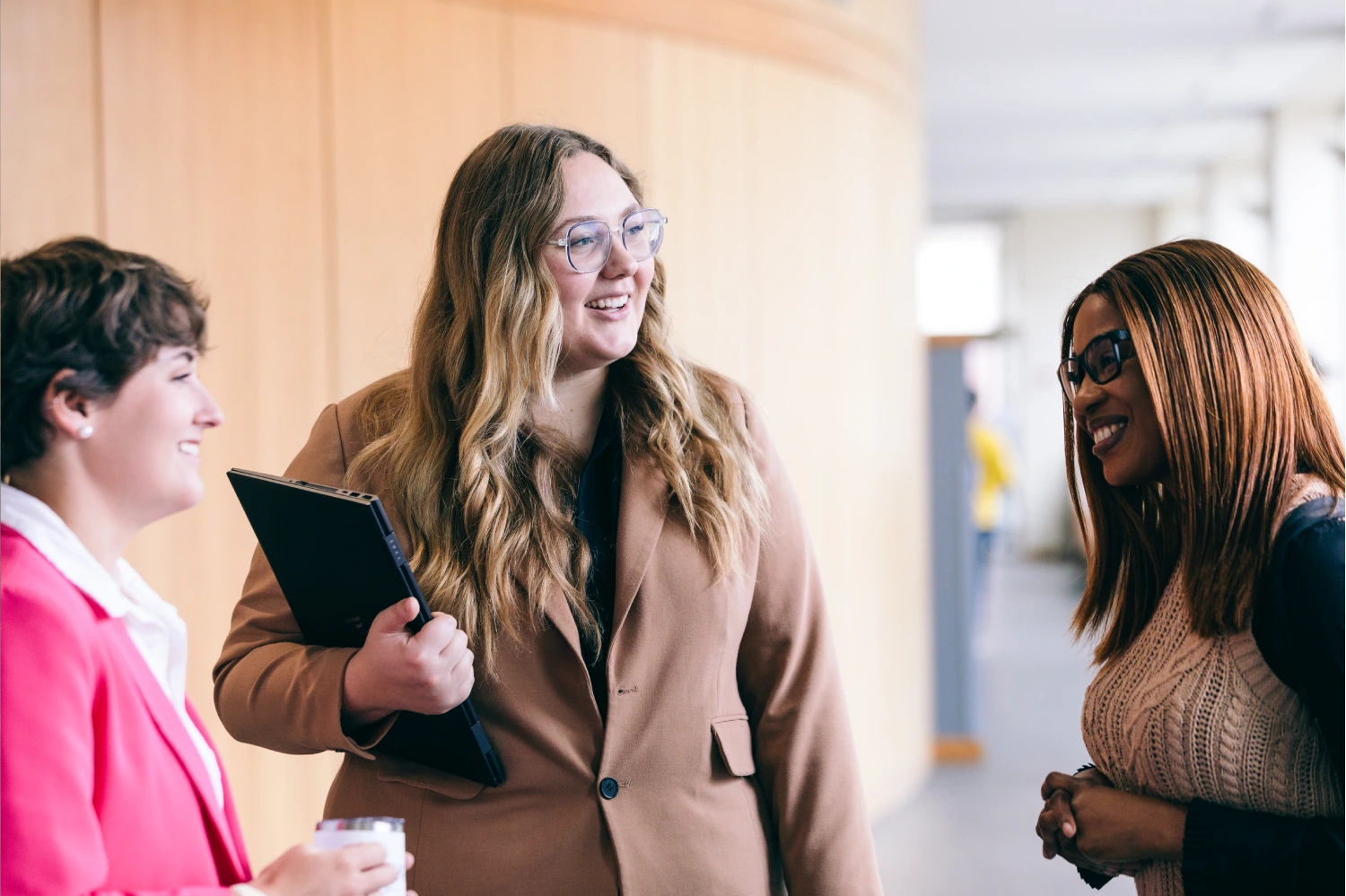 Three business students in conversation