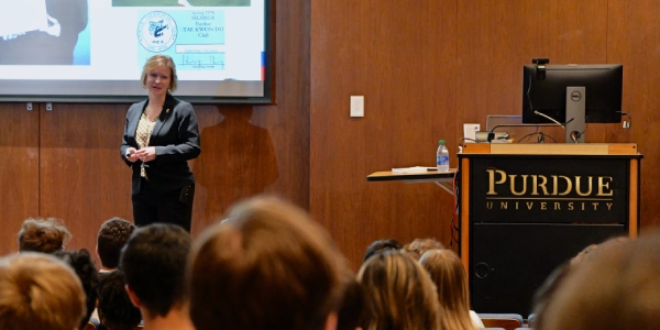 man speaking on stage