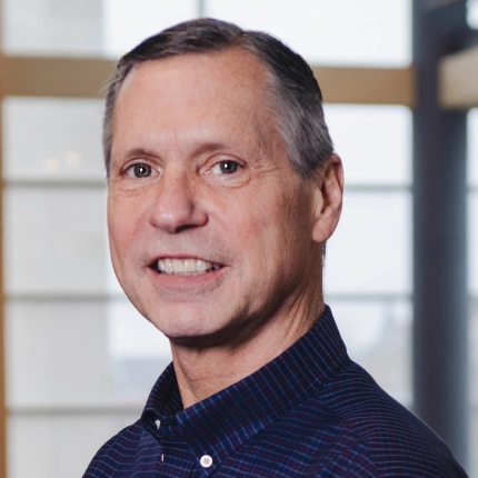 headshot of Tim Cason