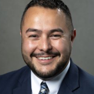 Headshot of Joél Muñoz