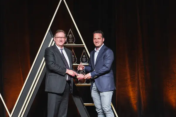 Two gentlemen shaking hands