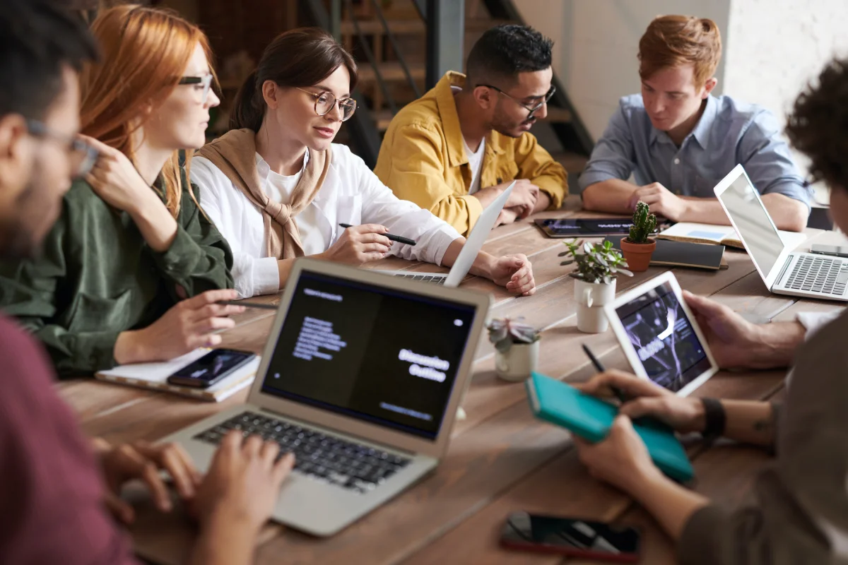 Group working collaboratively at table