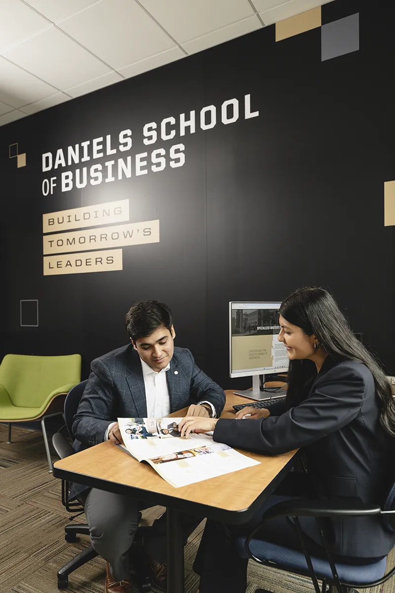 Two people meeting to discussion admissions