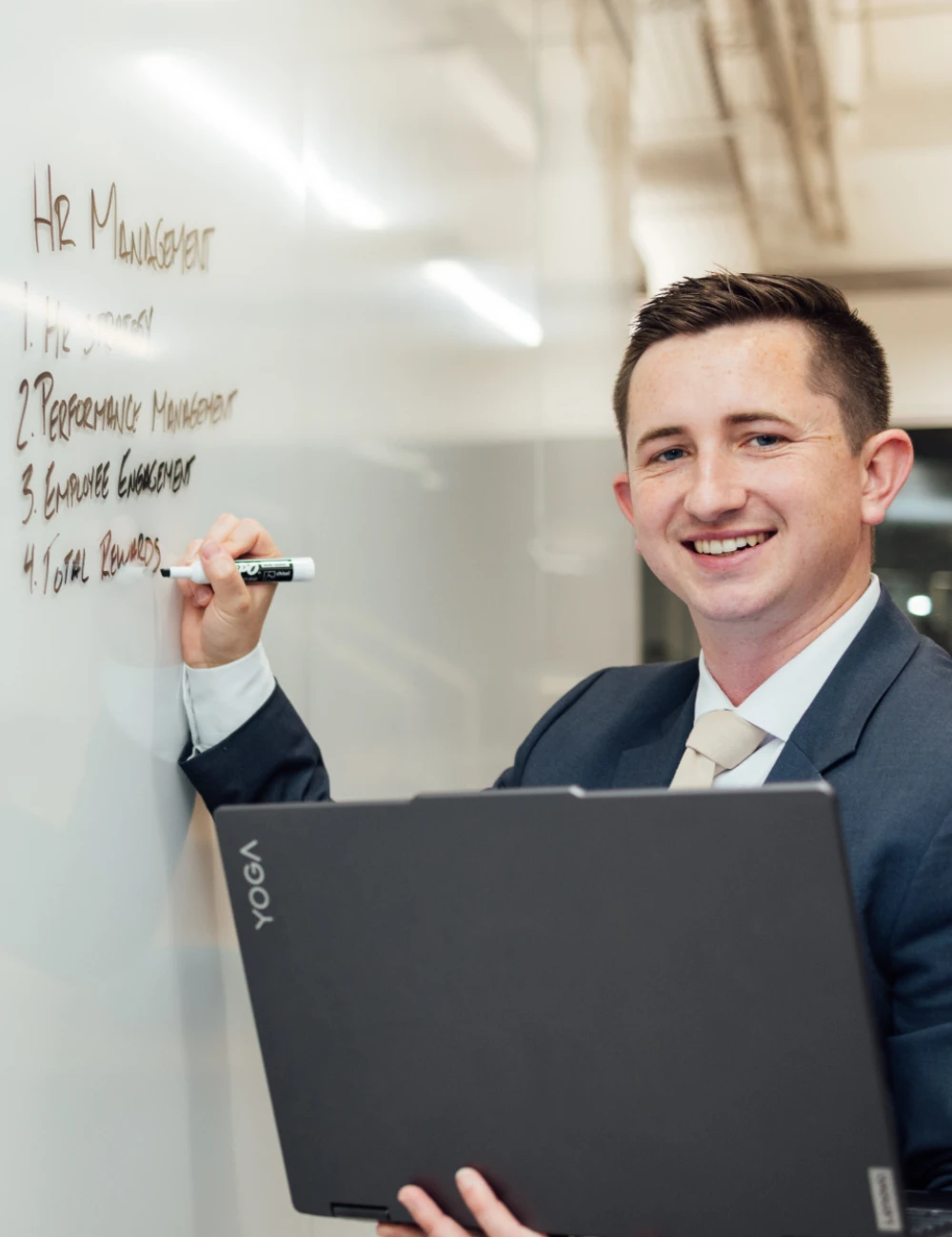Business student writing on white board