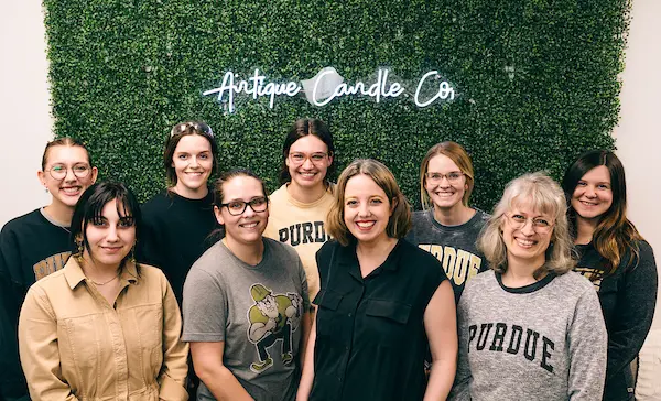 Whitenack and her co-workers, wearing Purdue gear