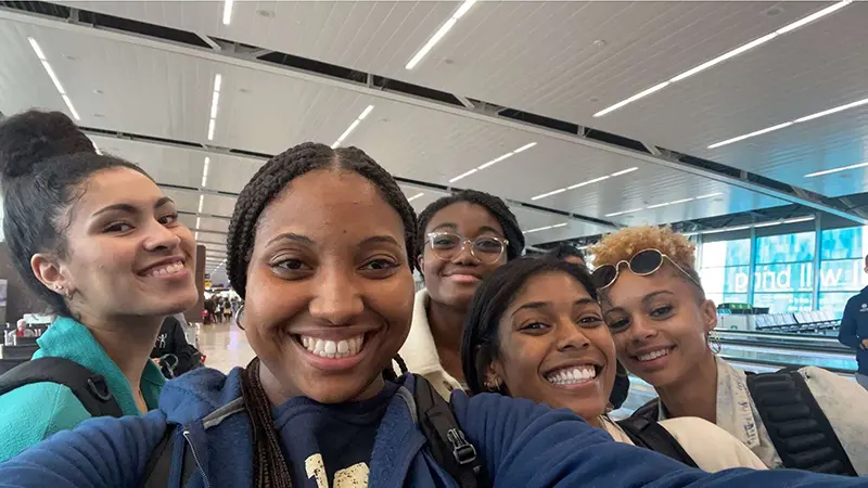 Rachel takes a selfie with friends