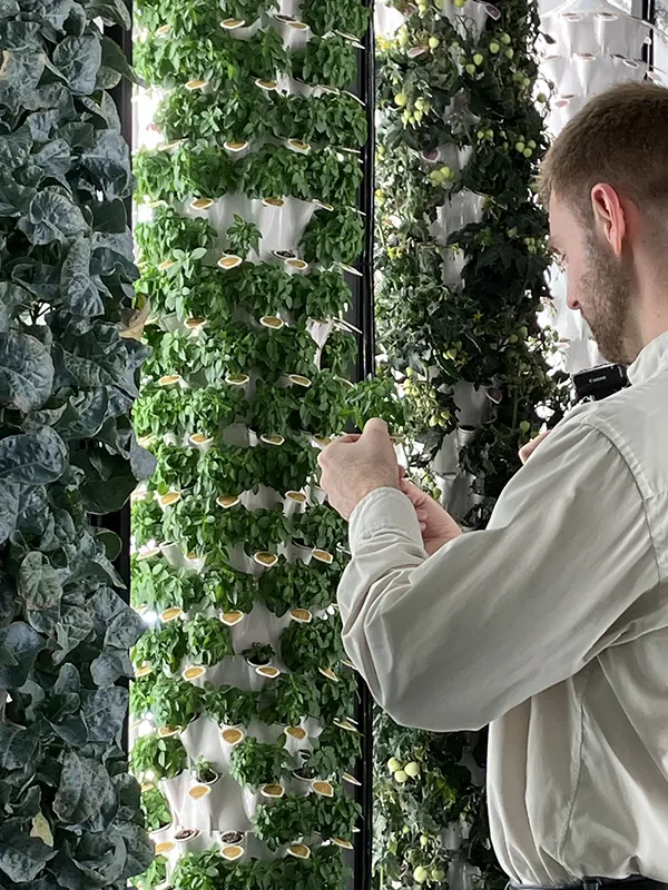 Scott Massey standing in a gro pod chamber