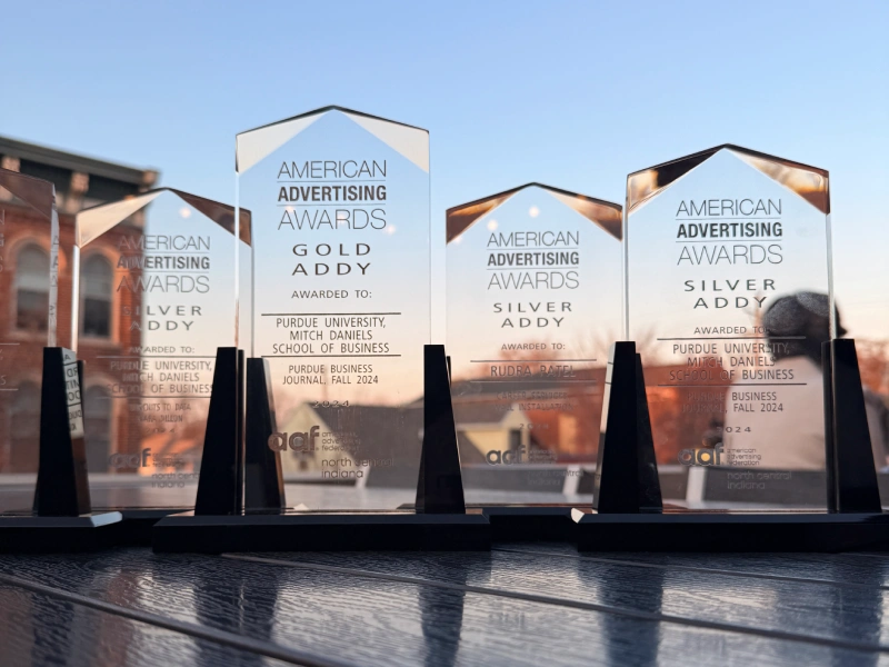 Addy Awards on table