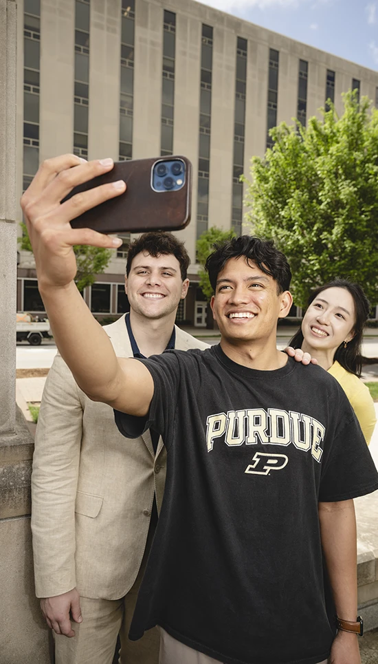 Batan, Foor, and Wang together on campus