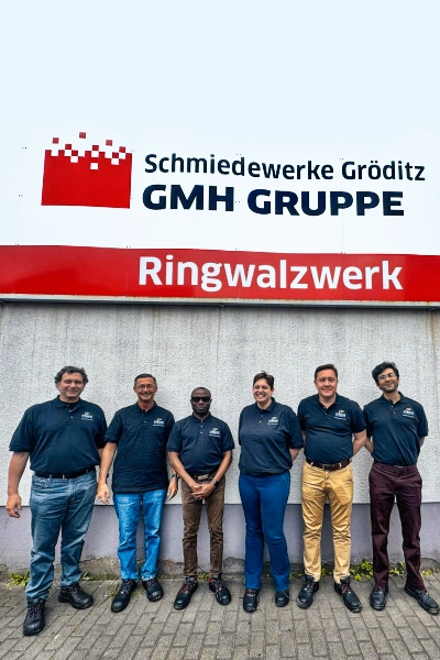 Group of students with Professor David at plant