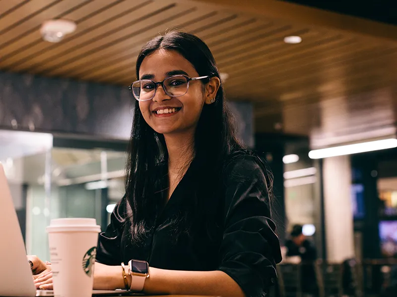Swasti Jain at a laptop