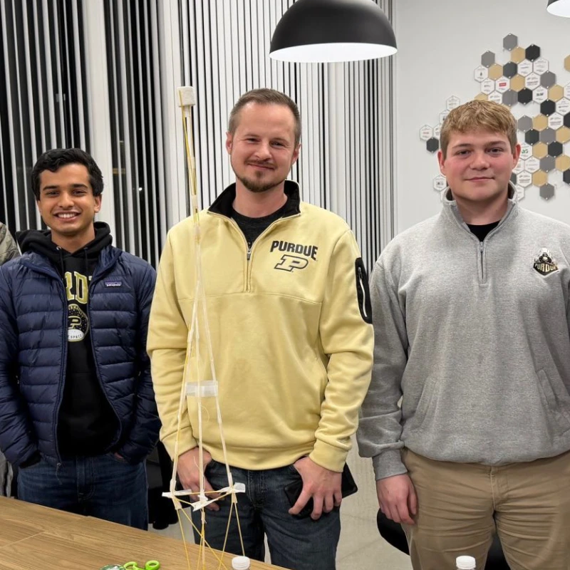 Greg Sapp with other students collaborate in classroom