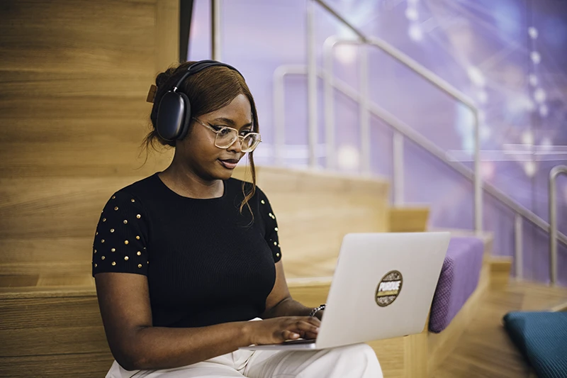 Student working on a laptop