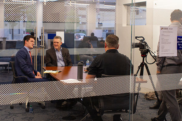 Charlie and Dean Bullard discussing